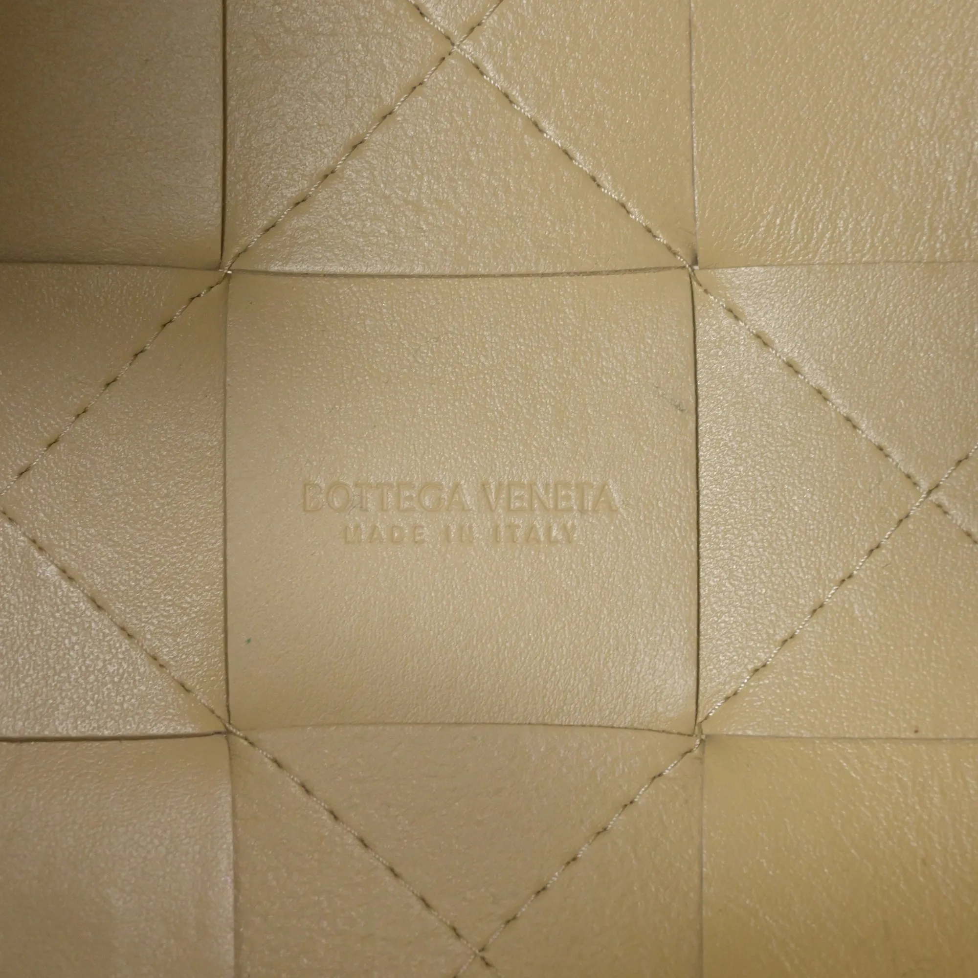 Bottega Veneta Small Cassette Cross Body Bucket Bag in Pastel Yellow Lambskin Leather