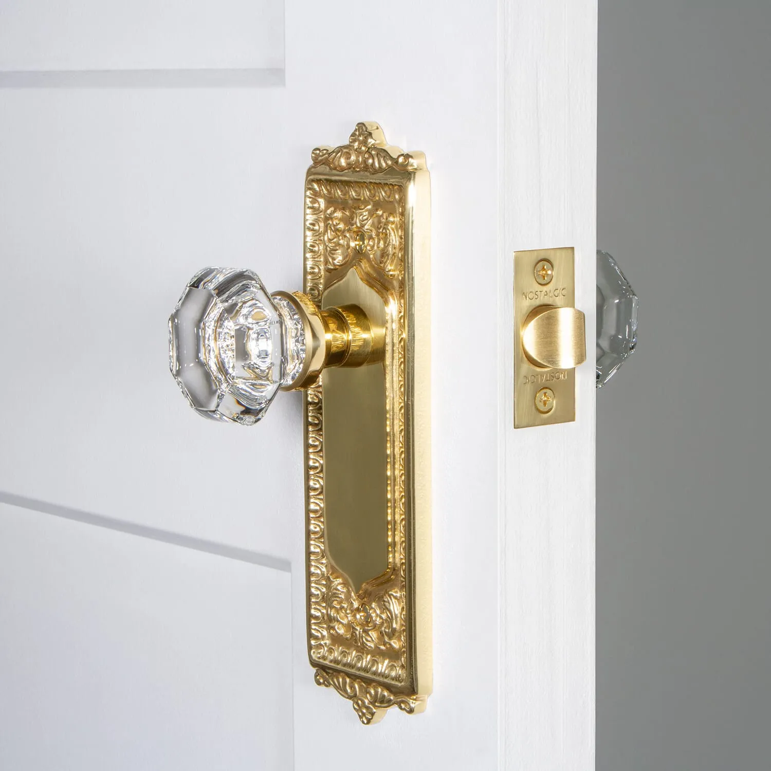 Egg & Dart Long Plate with Waldorf Knob in Polished Brass