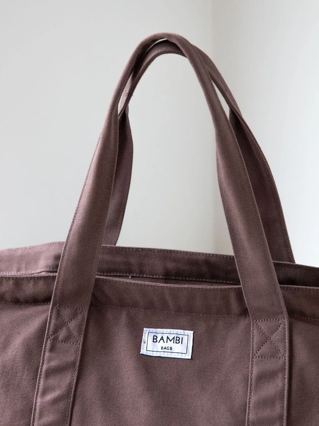 Imperfect Essential Bambi Bag Coffee Brown with original felt (unlined) insert