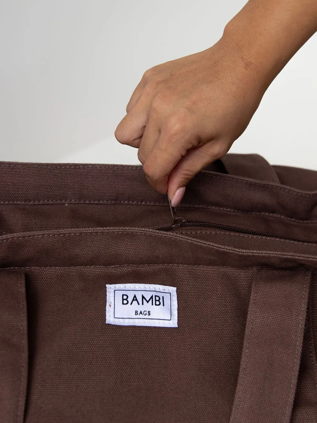 Imperfect Essential Bambi Bag Coffee Brown with original felt (unlined) insert