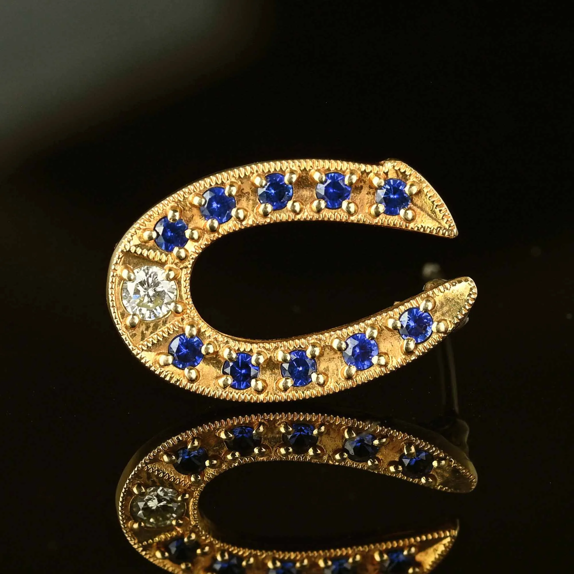 Vintage Gold Sapphire Diamond Horseshoe Brooch