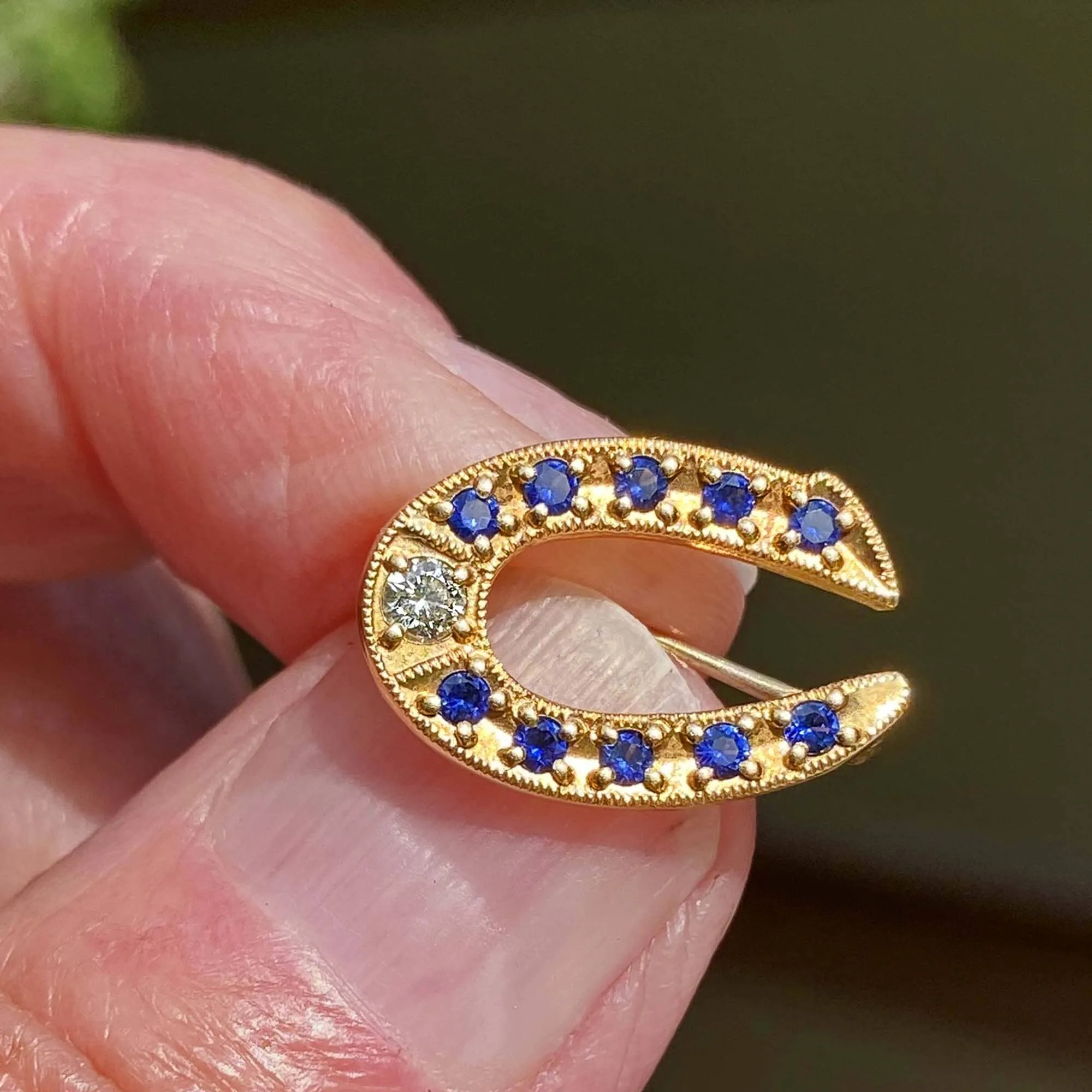 Vintage Gold Sapphire Diamond Horseshoe Brooch